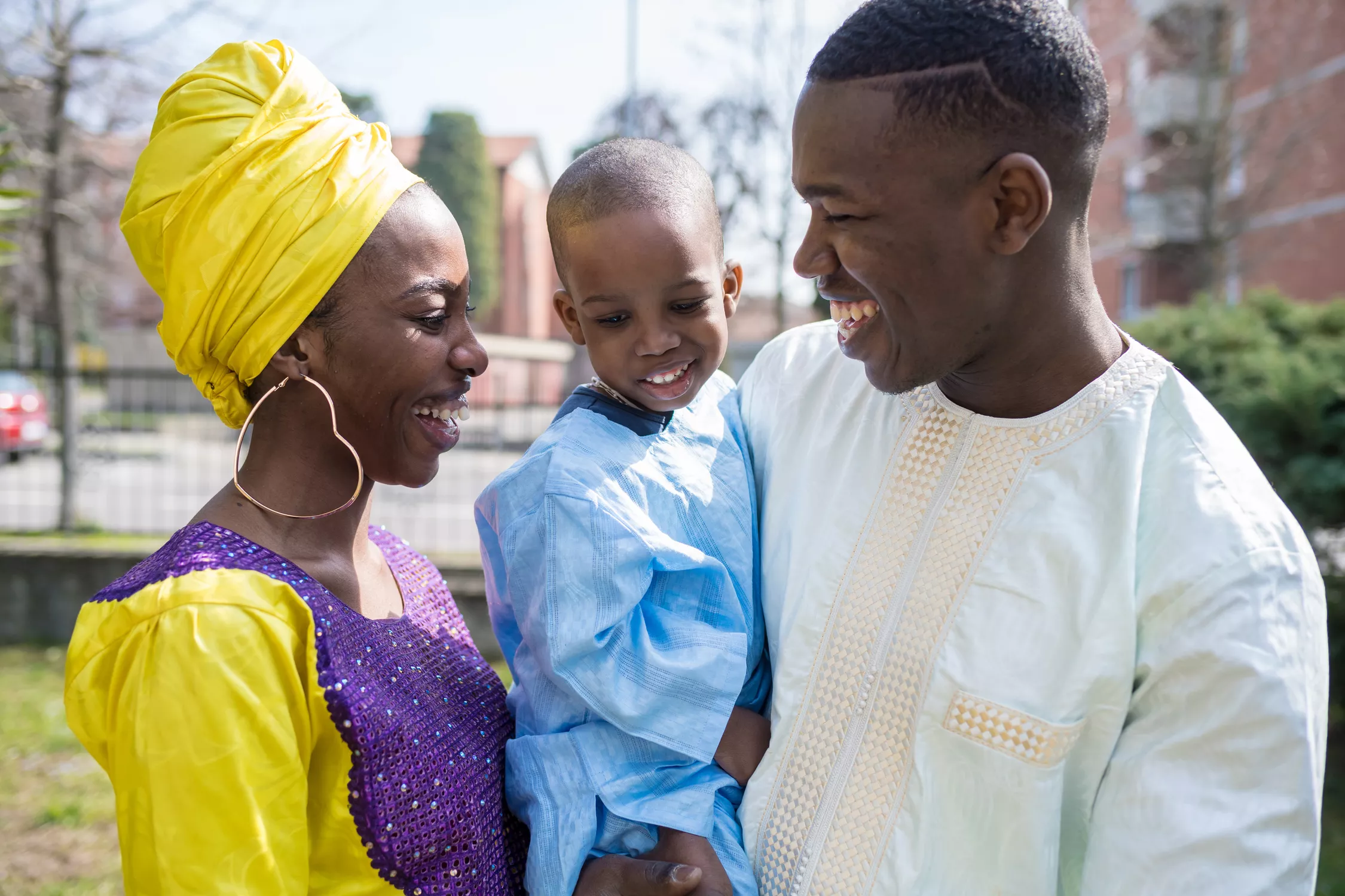 portrait-happy-family-outdoor-smiling-holding-thei-2024-10-18-06-26-50-utc-692ea0647da6c